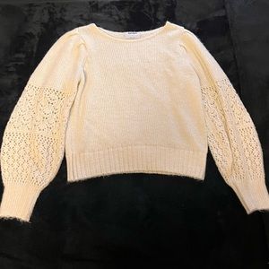 White knitted sweater